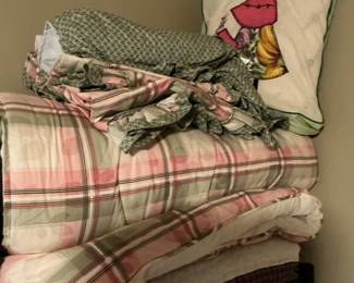 The pink, checkered, comforter, sheets, pillowcases bed skirt also sold this one