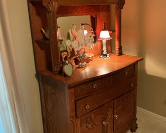 This is an antique carved sideboard