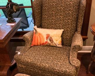 Very nice upholstered wingback chair with a footstool in the 1800 style