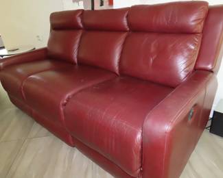 Dual power reclining sofa, red leather.