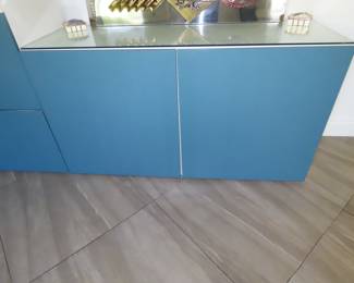 Blue and white storage drawers and cabinets.