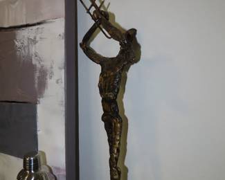 Brutalist metal sculpture "Trumpet Player"
