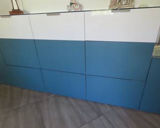 Blue and white storage drawers and cabinets.