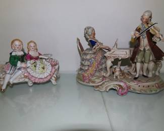 German porcelain musicians and victorian couple sitting.