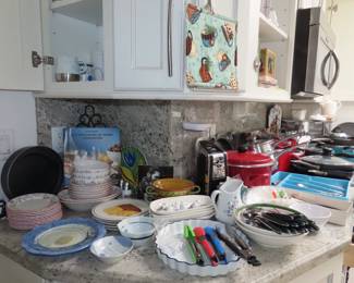 Kitchen items, everyday dishes, bakeware, cookware.