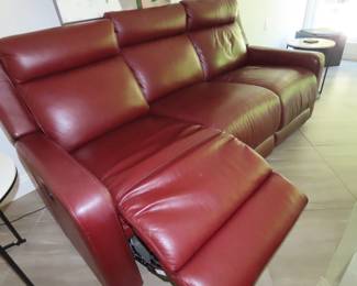 Dual power reclining sofa, red leather.