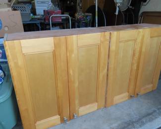 Two stoarge cupboards/cabinets.