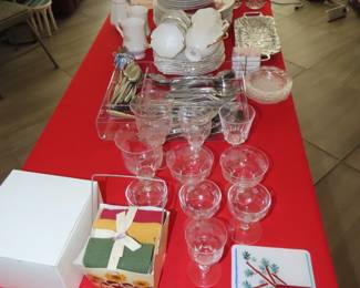Crystal stemware, formal flatware, luncheon plates, everyday dishes.