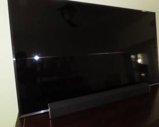 Smart TV and sound bar and sub woofer.
