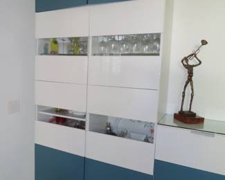 Blue and white storage drawers and cabinets.
