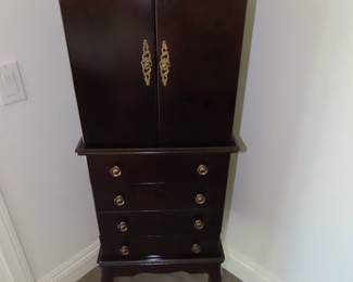 Free standing jewelry chest.
