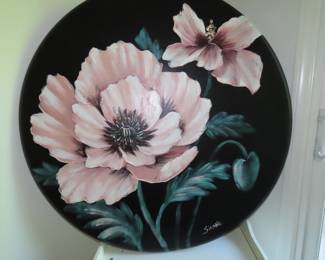 Large round oil painting.