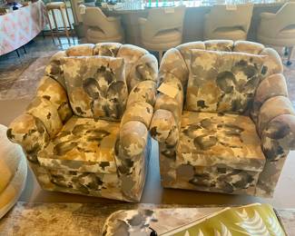 Pair of upholstered chairs with ottoman