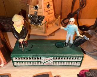 cast iron mechanical "Birdie Putt" bank