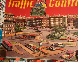 Traffic control metal board w box 
Small metal wind up trolleys , buses and cars 