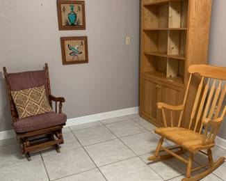 Glider, rocking chair, artwork, bookshelf
