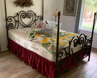 Metal frame bed with mattress in boxspring