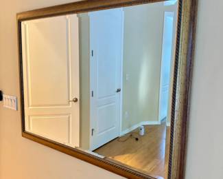 119 LargeBeveledWallMirrorGoldToneFramewSubtleCarvedDetailing