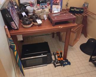 Danish modern sliding leaf dining table.