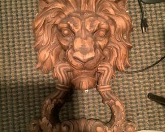 Wooden lion door knocker