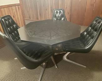 This Chrome Craft vintage table is in perfect condition.  A 48” octagon table with 4 chairs.  Notice the “v” legs on the chair.  Table was nicknamed the Star Trek table. Presale $3000.