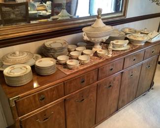 Buffet with China set on display.  