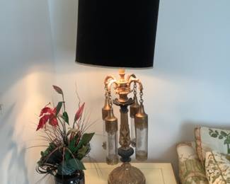 MCM lamp with hanging lights and black shade.  Has three different lights and all work . Measures 51” h