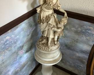 Two pieces….pillarstand and  Italian mom with child statue.