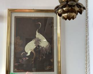 Picture and brass chandelier