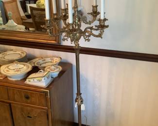Brass 9 candelabra light….weighted bottom.  Lights work.  Marble base. 62” t x 12” base  $185