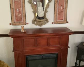 Freestanding Fireplace…..electric heat.