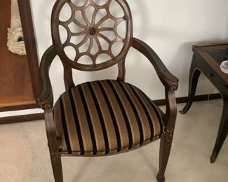 Spider back chair…brown stripe seat.  24” w x 38” h x 20” d.  
