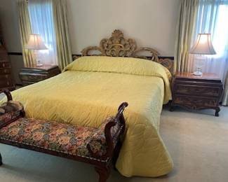 Ornate king headboard…the box spring and mattress are in two pieces.  One side lifts.  Has matching nightstands, dresser and armoire. Headboard presale $600.