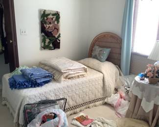 Twin beds with wicker headboard, mattress and box spring.  Each set $95.  Both for $175