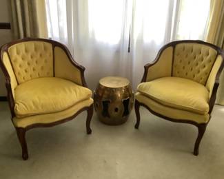 Pr. Of yellow side chairs…..$125 each …pr $200. Brass drum table not available.