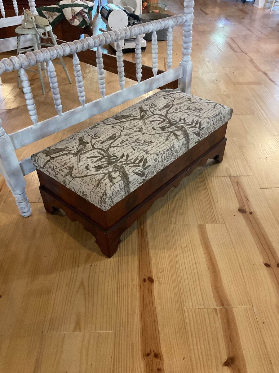 Upholstered trunk made out of old whiskey barrels
