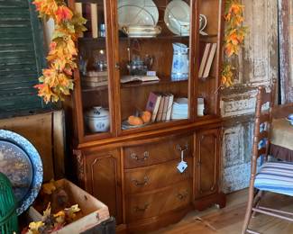 China hutch by J.B. VanSciverCo., antique trunk, assorted dishes and serving dishes