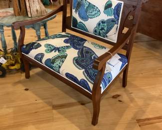 Reupholstered settee on castors