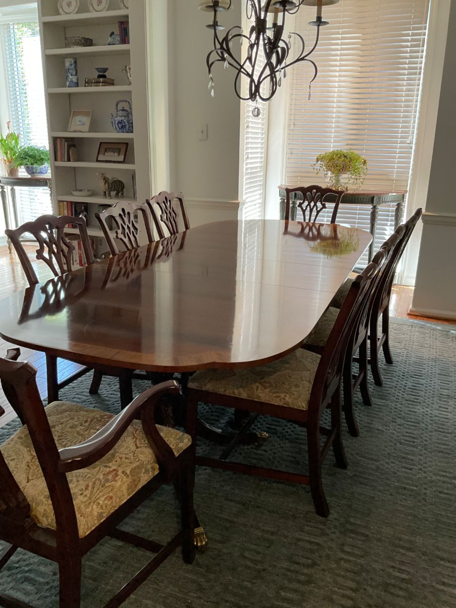 A99  Baker double pedestal, banded inlay dining table  with two 16” leaves;  pristine condition. 70” x 46”.  Can extend to 102”   Also comes with heat resistant pads.    Table $1800      Hickory Chippendale-style dining chairs; 8 total;  6 side chairs and 2 armed chairs, newly recovered with classic tapestry fabric  $125 each      Or save with  complete set $2800
