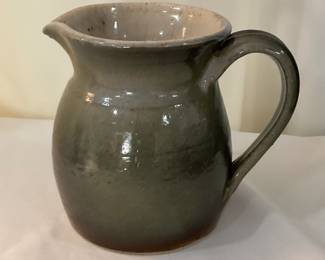 D506. Signed Rick Cheatam 6” pottery pitcher $15
