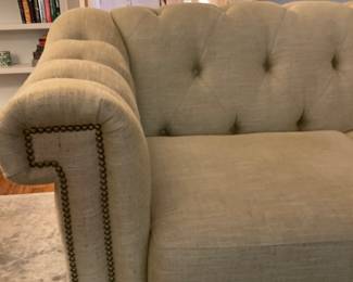 F906 Sherrill Furniture tufted Chesterfield-style sofa, neutral color with brass nailhead trim, turned arms, turned wooden feet. Excellent condition $1000