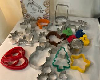 K201. Assorted cookie cutters and cookie press $6