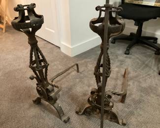 N175. Pair of antique wrought iron andirons, with poker $125