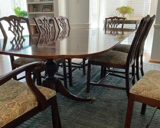 A99 Baker double pedestal, banded inlay dining table with two 16” leaves; pristine condition. 70” x 46”. Can extend to 102” Also comes with heat resistant pads. $1800. Hickory Chippendale-style dining chairs; 8 total; 6 side chairs and 2 armed chairs, newly recovered with classic tapestry fabric $125 each