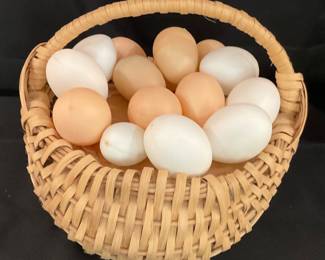 B124. Basket with plastic eggs $3