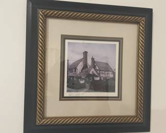 B138 Tom Caldwell print of Tutor-style house with gold rope style inner trim. 16x15.5”. $35