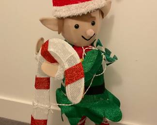 C417. Lighted elf with candy cane 42” $30