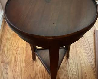 U808 Round mahagony side table with triangular lower shelf $35