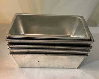 K-253. (4) small aluminum loaf pans $6