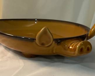 K235. 14” large brown-glazed pig shaped serving dish on feet $15